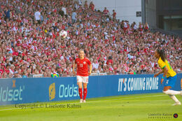 Janni Thomsen (#19 Denmark) with a throw-in in the friendly match Denmark vs Brazil at Parken Stadium, Copenhagen, Denmark