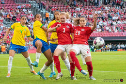 Stine Ballisager (#3 Denmark) and Signe Bruun (#20 Denmark) battle for the ball in the friendly match Denmark vs Brazil at Parken Stadium, Copenhagen, Denmark