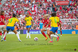 Pernille Harder (#10 Denmark) battles for the ball in the friendly match Denmark vs Brazil at Parken Stadium, Copenhagen, Denmark