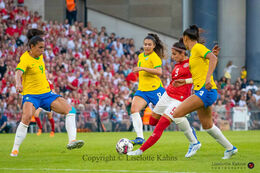 Nadia Nadim (#9 Denmark) battles for the ball in the friendly match Denmark vs Brazil at Parken Stadium, Copenhagen, Denmark