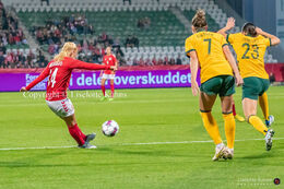 Sofie Bredgaard (#14 Denmark) with a shot in the friendly match Denmark vs Australia at Viborg Stadium, Denmark