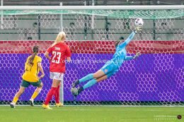 Lene Christensen (#1 Denmark) jumps for the ball in the friendly match Denmark vs Australia at Viborg Stadium, Denmark