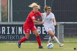 Janelle Cordia (#66 Fortuna Hjorring) and Maria Nielsen (#18 AGF) battle for the ball in the "Kvindeliga" match Fortuna Hjorring vs. AGF at "Bredbaand Nord Arena" in Hjorring, Denmark