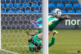 Sofie Gron (#28 AGF) jumping for the ball (penalty kick) in the "Kvindeliga" match Fortuna Hjorring vs. AGF at "Bredbaand Nord Arena" in Hjorring, Denmark