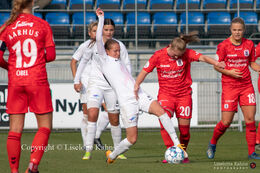 Karoline Olesen (#47 Fortuna Hjorring) and Emma Andersen (#20 AGF) battle for the ball in the "Kvindeliga" match Fortuna Hjorring vs. AGF at "Bredbaand Nord Arena" in Hjorring, Denmark