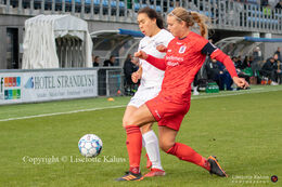 Assi Berthelsen (#18 Fortuna Hjorring) and Sofie Obel (#19 AGF) battle for the ball in the "Kvindeliga" match Fortuna Hjorring vs. AGF at "Bredbaand Nord Arena" in Hjorring, Denmark