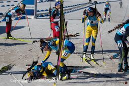 Linn Persson comforting an exhausted and disappointed Elvira Oeberg at the BMW IBU biathlon finals in Holmenkollen, Oslo, Norway