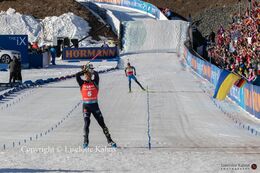 Erik Lesser celebrating his victory in the men's pursuit at the BMW IBU biathlon finals in Holmenkollen, Oslo, Norway