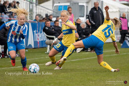 Beate Magnussen (#4 FC Thy-Thisted Q), Katrine W. Jorgensen (#13 Brondby IF) and Frederikke Lindhardt (#15 Brondby IF) battling for the ball in the Women's Cup Final
