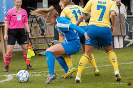 Battle for the ball in the Women's Cup Final, FC Thy-Thisted Q vs. Brondby IF at Lerpytter stadium in Thisted, Denmark
