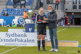 Maja B. Ostergaard (#1 FC Thy-Thisted Q) is voted "Cup Fighter of 2021" and receives the prize from Head Coach of "Kvindelandsholdet", Lars Sondergaard in the Women's Cup Final, FC Thy-Thisted Q vs. Brondby IF at Lerpytter stadium in Thisted, Denmark
