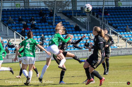 Tough fight for the ball in the "Gjensidige Kvindeliga" match between Fortuna Hjorring and KoldingQ
