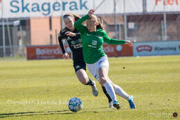 Emma Snerle fighting for the ball in the "Gjensidige Kvindeliga" match between Fortuna Hjorring and KoldingQ