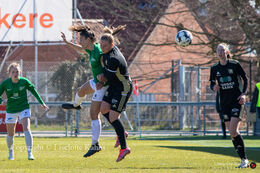 Victoria Bruce in an air duel in the "Gjensidige Kvindeliga" match between Fortuna Hjorring and KoldingQ