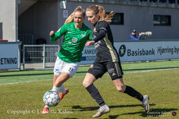 Olivia Holdt battling for the ball in the "Gjensidige Kvindeliga" match between Fortuna Hjorring and KoldingQ