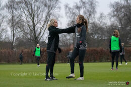 WEURO2022 training session in Herning, November 2020. Sophie Junge warming-up with physiotherapist Rikke Holm Brink