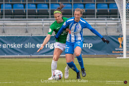 Janelle Cordia (#66 Fortuna Hjorring) and Rikke Dybdahl (#12 FC Thy) battle for the ball in the Cupfinal, Fortuna Hjorring vs. FC Thy at "Bredbaand Nord Arena" in Hjorring, Denmark
