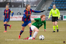 Caroline Graham Hansen (#16 FC Barcelona) and Brenna Rae Ochoa (#2 Fortuna Hjorring) in the UEFA Womens Champions League, round of 16 second-leg match between Fortuna Hjorring and FC Barcelona at Hjorring stadium in Hjorring, Denmark