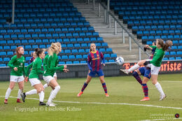 Emma Snerle (#10 Fortuna Hjorring) battles for the ball in the UEFA Womens Champions League, round of 16 second-leg match between Fortuna Hjorring and FC Barcelona at Hjorring stadium in Hjorring, Denmark