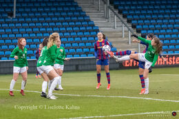 Emma Snerle (#10 Fortuna Hjorring) battles for the ball in the UEFA Womens Champions League, round of 16 second-leg match between Fortuna Hjorring and FC Barcelona at Hjorring stadium in Hjorring, Denmark