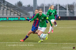 Sara Thrige Andersen (#15 Fortuna Hjorring) and Mariona Caldentey (#9 FC Barcelona) battle for the ball in the UEFA Womens Champions League, round of 16 second-leg match between Fortuna Hjorring and FC Barcelona at Hjorring stadium in Hjorring, DenmarkSara Thrige Andersen (#15 Fortuna Hjorring) and Mariona Caldentey (#9 FC Barcelona) battle for the ball in the UEFA Womens Champions League, round of 16 second-leg match between Fortuna Hjorring and FC Barcelona at Hjorring stadium in Hjorring, Denmark