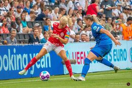 Pernille Harder (#10 Denmark) battles for the ball in the Women's Euro 2022 match Denmark vs Finland at Stadium MK, Milton Keynes, England