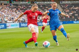 Janni Thomsen (#19 Denmark) with a shot in the Women's Euro 2022 match Denmark vs Finland at Stadium MK, Milton Keynes, England