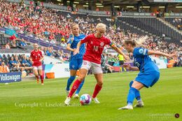 Pernille Harder (#10 Denmark) battles for the ball in the Women's Euro 2022 match Denmark vs Finland at Stadium MK, Milton Keynes, England