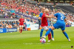 Pernille Harder (#10 Denmark) battles for the ball in the Women's Euro 2022 match Denmark vs Finland at Stadium MK, Milton Keynes, England