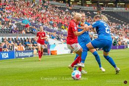 Pernille Harder (#10 Denmark) battles for the ball in the Women's Euro 2022 match Denmark vs Finland at Stadium MK, Milton Keynes, England