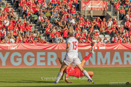 Sofie Bredgaard (#14 Denmark) with a bicycle shot in the World Cup qualifier Denmark vs Montenegro at Viborg Stadium, Denmark