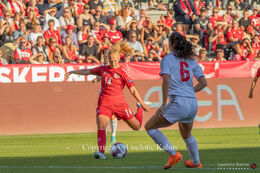 Sofie Bredgaard (#14 Denmark) preparing for a shot in the World Cup qualifier Denmark vs Montenegro at Viborg Stadium, Denmark