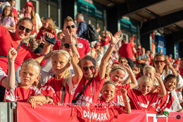 Happy fans in the stands in the World Cup qualifier Denmark vs Montenegro at Viborg Stadium, Denmark