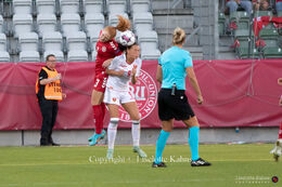 Stine Ballisager (#3 Denmark) battles for the ball in the World Cup qualifier Denmark vs Montenegro at Viborg Stadium, Denmark