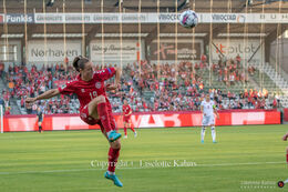 Janni Thomsen (#19 Denmark) with a shot in the World Cup qualifier Denmark vs Montenegro at Viborg Stadium, Denmark