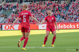Karen Holmgaard (#6 Denmark) and Katrine Veje (#11 Denmark) celebrate the 1-0 goal in the World Cup qualifier Denmark vs Montenegro at Viborg Stadium, Denmark