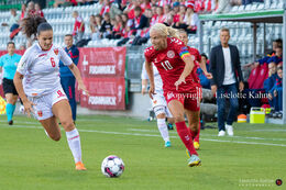 Pernille Harder (#10 Denmark) preparing for a shot in the World Cup qualifier Denmark vs Montenegro at Viborg Stadium, Denmark