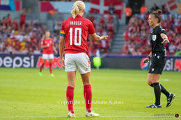 Pernille Harder (#10 Denmark) arguing with the referee in the Women's Euro 2022 match Denmark vs Spain at Brentford Stadium, London, England