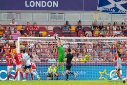 Lene Christensen (#1 Denmark) with a save in the Women's Euro 2022 match Denmark vs Spain at Brentford Stadium, London, England