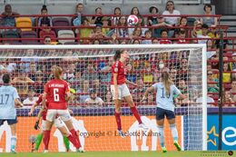 Simone Boye (#5 Denmark) with a header in the Women's Euro 2022 match Denmark vs Spain at Brentford Stadium, London, England