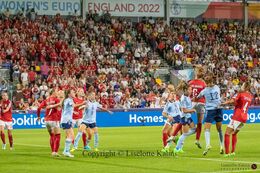Karen Holmgaard (#6 Denmark) with a header in the Women's Euro 2022 match Denmark vs Spain at Brentford Stadium, London, England