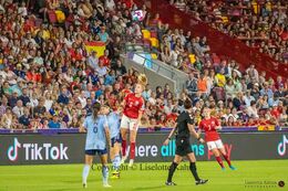 Karen Holmgaard (#6 Denmark) with a header in the Women's Euro 2022 match Denmark vs Spain at Brentford Stadium, London, England