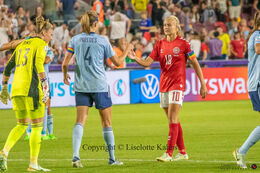 Pernille Harder (#10 Denmark) acknowledging the Spanish captain after the the Women's Euro 2022 match Denmark vs Spain at Brentford Stadium, London, England