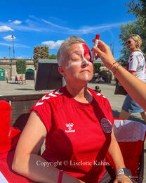 The Danish fans gathering at the "One over the Ait" bar to prepare for the Women's Euro 2022 match Denmark vs Spain at Brentford Stadium, London, England