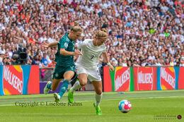 Svenja Huth (#9 Germany) and Rachel Daly (#3 England) battle for the ball in the Women's Euro 2022 Final England vs Germany at Wembley Stadium, London, England