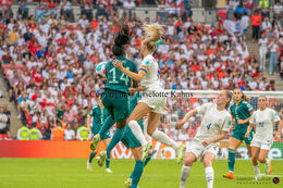 Leah Williamson (#8 England) and Nicole Anyomi (#14 Germany) battle for the ball in the Women's Euro 2022 Final England vs Germany at Wembley Stadium, London, England