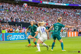 Lena Oberdorf (#6 Germany), Svenja Huth (#9 Germany) and Chloe Kelly (#18 England) battle for the ball in the Women's Euro 2022 Final England vs Germany at Wembley Stadium, London, England