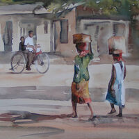 Young women carrying boxes