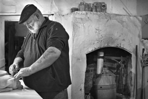 Mark Robinson preparing Christmas goose, R. Todd & Son
