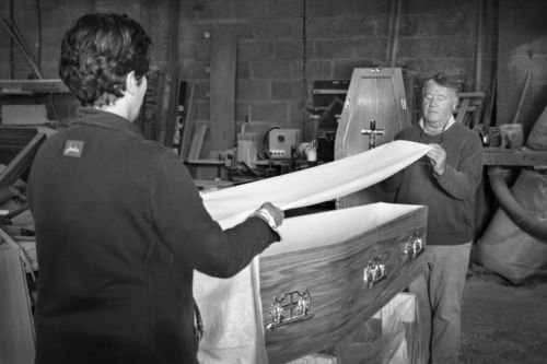 Nichola and her father John lining a coffin